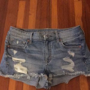 Distressed light wash jean shorts